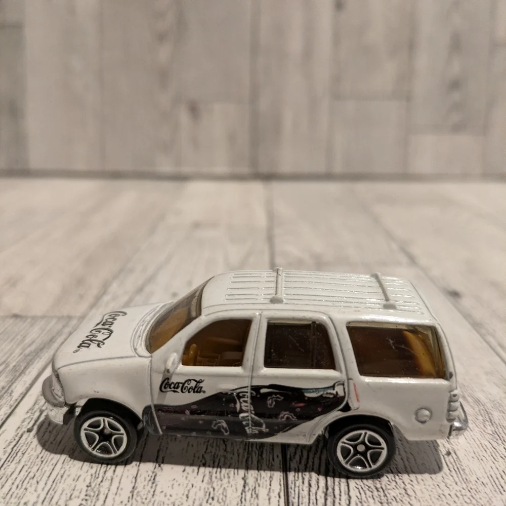 Coca Cola White Die-Cast SUV Toy with Black Graphics
